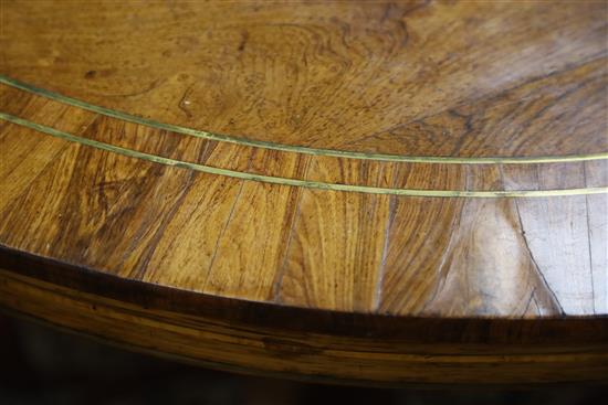 A Regency brass strung rosewood breakfast table, Diam.3ft 10in. H.2ft 6in.